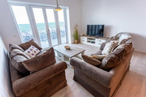 Komfort-Ferienwohnung Wellenbrecher by Meer-Ferienwohnungen, Olpenitz
